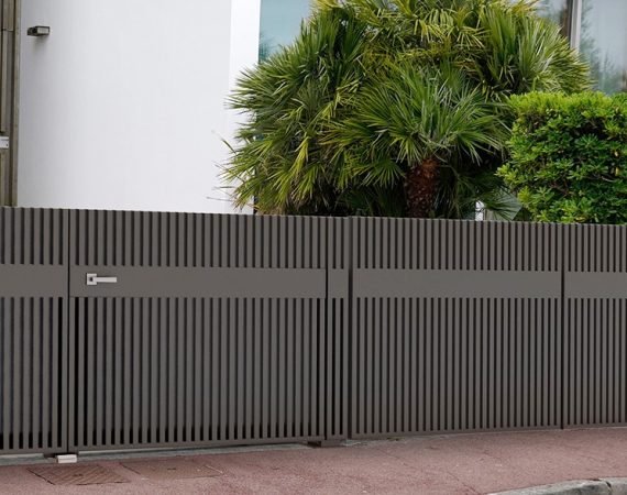 wooden brown natural modern gate of private house building